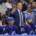 
              Tampa Bay Lightning head coach Jon Cooper directs players on the ice during the second period in Game 4 of the NHL Hockey Stanley Cup playoffs Eastern Conference finals against the New York Rangers, Tuesday, June 7, 2022, in Tampa, Fla. (AP Photo/Chris O'Meara)
            