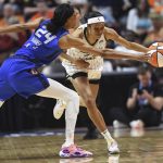 
              Connecticut Sun forward DeWanna Bonner (24) tries to slow Chicago Sky guard Rebekah Gardner during a WNBA basketball game Friday, June 10, 2022, in Uncasville, Conn. (Sean D. Elliot/The Day via AP)
            