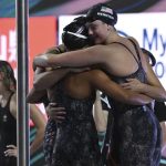 
              Team of United States celebrate their victory in the Women 4x200m Freestyle Relay final at the 19th FINA World Championships in Budapest, Hungary, Wednesday, June 22, 2022. (AP Photo/Anna Szilagyi)
            