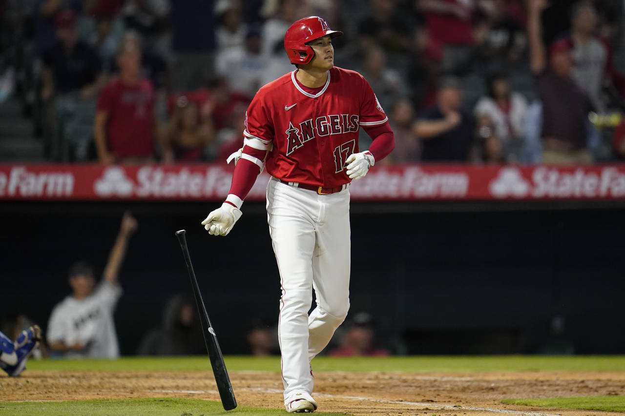 Los Angeles Angels designated hitter Shohei Ohtani (17) runs the bases after hitting a home run dur...