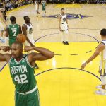 
              Boston Celtics center Al Horford (42) celebrates after scoring against the Golden State Warriors during the second half of Game 1 of basketball's NBA Finals in San Francisco, Thursday, June 2, 2022. (Jed Jacobsohn/Pool Photo via AP)
            