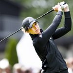 
              Linn Grant of Sweden plays from the first tee during the final round of the Scandinavian Mixed at Halmstad Golf Club, Sweden, Sunday June 12, 2022. (Pontus Lundahl/TT via AP)
            