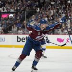 
              Colorado Avalanche right wing Valeri Nichushkin celebrates his goal against the Tampa Bay Lightning during the second period in Game 2 of the NHL hockey Stanley Cup Final, Saturday, June 18, 2022, in Denver. (AP Photo/John Locher)
            