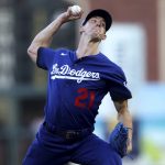 
              Los Angeles Dodgers' Walker Buehler pitches against the San Francisco Giants during the first inning of a baseball game in San Francisco, Friday, June 10, 2022. (AP Photo/Jed Jacobsohn)
            