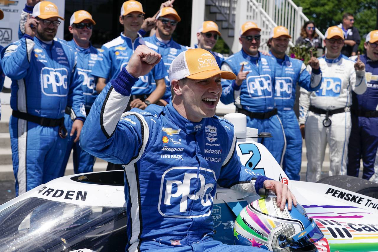 Josef Newgarden reacts after winning the Sonsio Grand Prix auto race Sunday, June 12, 2022, in Elkh...