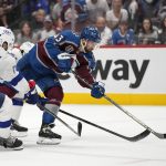 
              Colorado Avalanche center Darren Helm (43) shoots for a goal during the second period against the Tampa Bay Lightning in Game 2 of the NHL hockey Stanley Cup Final, Saturday, June 18, 2022, in Denver. (AP Photo/John Locher)
            