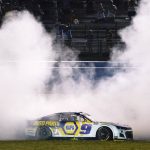 
              Chase Elliott does a burnout after winning a NASCAR Cup Series auto race Sunday, June 26, 2022, in Lebanon, Tenn. (AP Photo/Mark Humphrey)
            