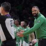 
              Boston Celtics head coach Ime Udoka argues with officials while facing the Miami Heat during the first half of Game 4 of the NBA basketball playoffs Eastern Conference finals, Monday, May 23, 2022, in Boston. (AP Photo/Charles Krupa)
            