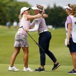 
              Brooke M. Henderson, of Canada, center, gets a hug from Lindsey Weaver-Wright, left, after defeating Weaver-Wright in a playoff at the ShopRite LPGA Classic golf tournament, Sunday, June 12, 2022, in Galloway, N.J. (AP Photo/Matt Rourke)
            