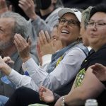
              Seattle Storm co-owner Ginny Gilder, center, cheers as she sits courtside on May 18, 2022, at Climate Pledge Arena during a WNBA basketball game between the Seattle storm and the Chicago Sky in Seattle. As Title IX marks its 50th anniversary in 2022, Gilder is one of countless women who benefited from the enactment and execution of the law and translated those opportunities into becoming leaders in their professional careers. (AP Photo/Ted S. Warren)
            