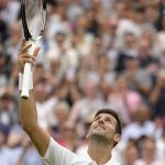 
              Serbia's Novak Djokovic celebrates after beating Korea's Kwon Soonwoo in a men's first round singles match on day one of the Wimbledon tennis championships in London, Monday, June 27, 2022. (AP Photo/Kirsty Wigglesworth)
            