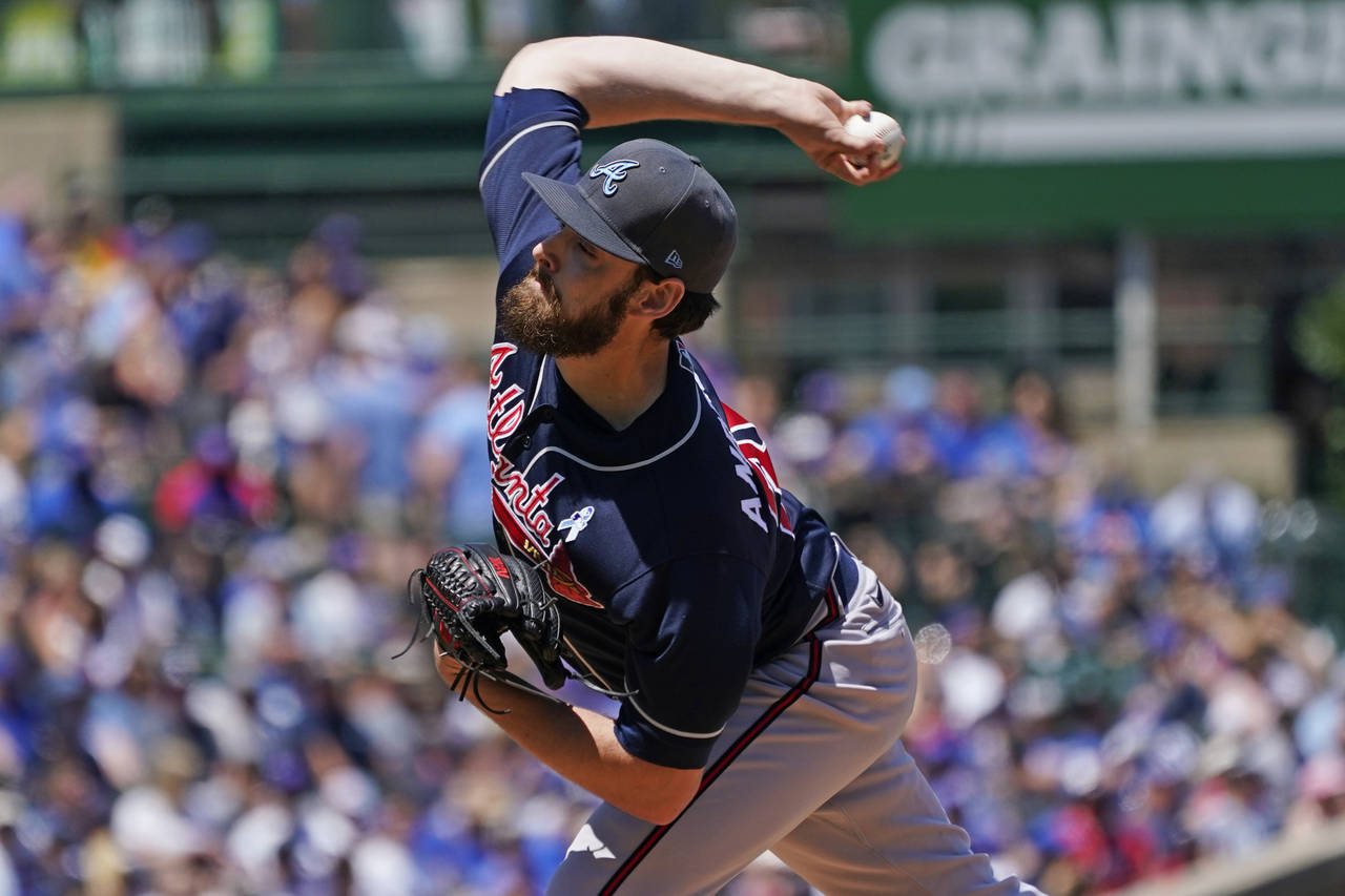 Atlanta Braves starting pitcher Ian Anderson throws against the Chicago Cubs during the first innin...