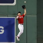 
              Boston Red Sox's Rob Refsnyder makes the catch on the fly out by Oakland Athletics' Ramon Laureano during the sixth inning of a baseball game, Tuesday, June 14, 2022, in Boston. (AP Photo/Michael Dwyer)
            