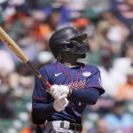 
              Minnesota Twins' Nick Gordon watches his RBI double to center during the fourth inning of a baseball game, Thursday, June 2, 2022, in Detroit. Trevor Larnach scored on the play. (AP Photo/Carlos Osorio)
            