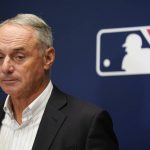 
              Major League Baseball Commissioner Rob Manfred speaks to reporters following an owners' meeting at MLB headquarters in New York, Thursday, June 16, 2022. (AP Photo/Seth Wenig)
            