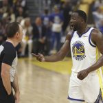 
              Golden State Warriors forward Draymond Green (23) gestures toward referee Josh Tiven during the first half of Game 2 of basketball's NBA Finals between the Warriors and the Boston Celtics in San Francisco, Sunday, June 5, 2022. (AP Photo/Jed Jacobsohn)
            