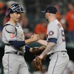 
              Houston Astros closer Ryan Pressly (55) is congratulated by catcher Jason Castro after the team's win over the Texas Rangers in a baseball game in Arlington, Texas, Tuesday, June 14, 2022. (AP Photo/LM Otero)
            
