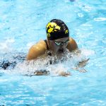 
              University of Iowa's Alexa Puccini competes in the 200-yard individual medley during an NCAA Big Ten Conference swimming and diving meet, Saturday, Jan. 16, 2021, in Iowa City, Iowa. In late 2020, several women's athletes at the University of Iowa sued after the school announced it was cutting men's and women's swimming and diving, men's tennis and men's gymnastics. Sage Ohlensehlen was a senior swimmer and headed up the lawsuit, while Alexa Puccini was a freshman swimmer. (Joseph Cress/Iowa City Press-Citizen via AP)
            
