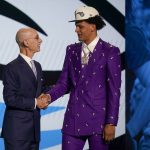 
              Paolo Banchero, right, is congratulated by NBA Commissioner Adam Silver after being selected as the number one pick overall by the Orlando Magic in the NBA basketball draft, Thursday, June 23, 2022, in New York. (AP Photo/John Minchillo)
            
