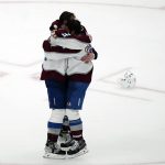 
              Colorado Avalanche defenseman Josh Manson (42), left, hugs center Andrew Cogliano (11) after the Avalanche defeated the Tampa Bay Lightning, 2-1 to win the NHL hockey Stanley Cup Finals on Sunday, June 26, 2022, in Tampa, Fla. (AP Photo/John Bazemore)
            
