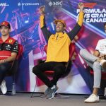 
              McLaren F1 Team driver Daniel Ricciardo, of Australia, reacts next to Scuderia Ferrari driver Charles Leclerc, left, of Monaco and Mercedes Team British driver George Russell during a news conference at the Canadian Grand Prix Friday, June 17, 2022, in Montreal. (Paul Chiasson/The Canadian Press via AP)
            