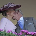
              Britain's Prince Charles greets Sophie, Countess of Wessex, in the stands on day one of the Royal Ascot horse racing meeting, at Ascot Racecourse, in Ascot, England, Tuesday June 14, 2022. (AP Photo/Alastair Grant)
            