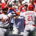 
              St. Louis Cardinals Lars Nootbaar is congratulated by Ivan Herrera after hitting a home run during the fifth inning of a baseball game against the Milwaukee Brewers Thursday, June 23, 2022, in Milwaukee. (AP Photo/Morry Gash)
            