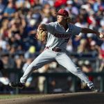 
              Arkansas starting pitcher Hagen Smith (33) throws in the first inning against Mississippi during an NCAA College World Series baseball game Wednesday, June 22, 2022, in Omaha, Neb. (AP Photo/John Peterson)
            