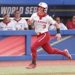 
              Oklahoma' Grace Lyons (3) runs home in the third inning of an NCAA softball Women's College World Series game against Northwestern on Thursday, June 2, 2022, in Oklahoma City. (AP Photo/Alonzo Adams)
            