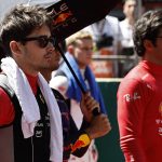 
              Ferrari driver Charles Leclerc of Monaco and his teammate Carlos Sainz of Spain stand prior to the start of the Azerbaijan Formula One Grand Prix at the Baku circuit, in Baku, Azerbaijan, Sunday, June 12, 2022. (Hamad Mohammed, Pool Via AP)
            