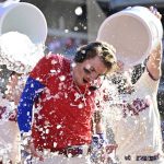 
              Philadelphia Phillies' Bryson Stott is doused by teammates after hitting a walkoff three-run home run during the ninth inning of a baseball game off Los Angeles Angels' Jimmy Herget, Sunday, June 5, 2022, in Philadelphia. (AP Photo/Derik Hamilton)
            