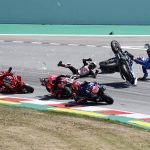 
              Spain's rider Alex Rins of the Team SUZUKI ECSTAR, top right, and Japan's rider Takaaki Nakagami of the LCR Honda IDEMITSU and Italian rider Francesco Bagnaia of the Ducati Lenovo Team, left, fall down during the MotoGP race of the Catalunya Motorcycle Grand Prix at the Catalunya racetrack in Montmelo, just outside of Barcelona, Spain, Sunday, June 5, 2022. (AP Photo/Joan Monfort)
            