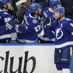 
              Tampa Bay Lightning center Steven Stamkos, right, celebrates his goal against the New York Rangers during the third period in Game 4 of the NHL Hockey Stanley Cup playoffs Eastern Conference finals Tuesday, June 7, 2022, in Tampa, Fla. (AP Photo/Chris O'Meara)
            