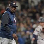 
              Houston Astros manager Dusty Baker walks to the dugout after pulling starting pitcher Jose Urquidy during the fifth inning of a baseball game against the Seattle Mariners, Saturday, May 28, 2022, in Seattle. (AP Photo/Ted S. Warren)
            