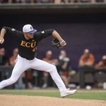 
              East Carolina's Danny Beal throws a pitch during the first inning of an NCAA college super regional baseball game against Texas on Sunday, June 12, 2022, in Greenville, N.C. (AP Photo/Matt Kelley)
            