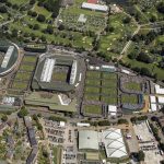 
              FILE - An aerial view of All England Tennis Club during day seven of the Wimbledon Tennis Championships in London, Monday, July 8, 2019. The first round of Wimbledon 2022 begins June 27. (Thomas Lovelock, AELTC via AP, Pool, File)
            