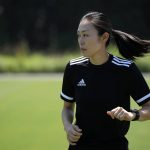 
              Japanese referee Yoshimi Yamashita warms up during a training session Monday, June 27, 2022, at JFA YUME Field in Chiba, near Tokyo. Yamashita is one three three women picked in a pool of 36 head referees for the men's World Cup in Qatar, which opens in just under five months on Nov. 21. It's the first time a female will be in charge on soccer largest stage. (AP Photo/Eugene Hoshiko)
            