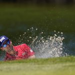 
              James Piot hits out of a bunker on the 18th green during the first round of the Charles Schwab Challenge golf tournament at the Colonial Country Club, Thursday, May 26, 2022, in Fort Worth, Texas. (AP Photo/Tony Gutierrez)
            