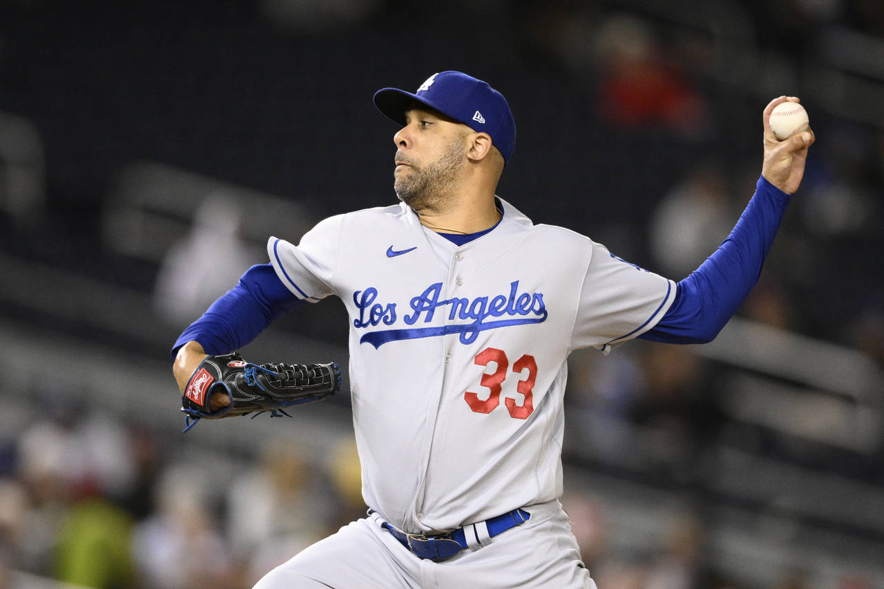 Los Angeles Dodgers relief pitcher David Price throws during the seventh inning of a baseball game ...