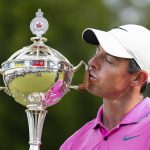 
              Rory McIlroy, of Northern Ireland, kisses the trophy after winning the Canadian Open golf tournament at St. George's Golf and Country Club in Toronto,  Sunday, June 12, 2022. (Nathan Denette/The Canadian Press via AP)
            