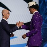 
              Paolo Banchero, right, is congratulated by NBA Commissioner Adam Silver after being selected as the number one pick overall by the Orlando Magic in the NBA basketball draft, Thursday, June 23, 2022, in New York. (AP Photo/John Minchillo)
            