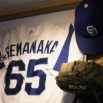 
              A jersey (No. 65), a cap, a bat and a glove used by Norberto Semanaka for the Chunichi Dragons baseball team, are decorated at a Brazilian restaurant he runs in Oizumi town, about 90 kilometers (55 miles) northwest of Tokyo, Tuesday, May 31, 2022. Norberto played professional baseball for the Chunichi Dragons, a game he learned in the Japanese community near Sao Paulo. Almost no one in Brazil plays baseball, unlike other hotbeds for the sport in Latin America. (AP Photo/Hiro Komae)
            