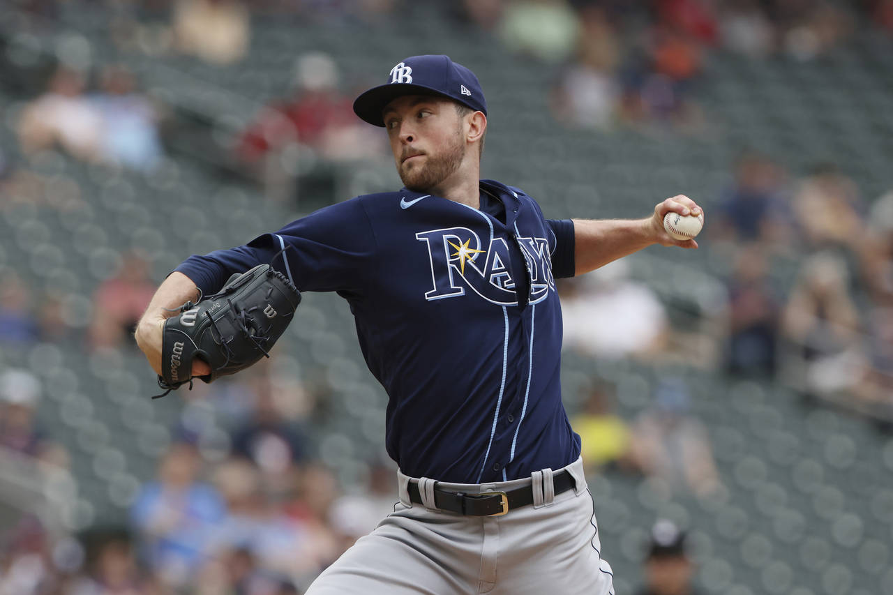 Tampa Bay Rays starting pitcher Jeffrey Springs (59) throws during the first inning of a baseball g...