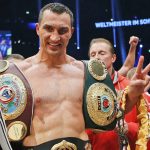 
              FILE - IBF, WBA, WBO and IBO champion Wladimir Klitschko, from Ukraine, celebrates after winning the IBF heavyweight world championships title bout against Bulgarian boxer Kubrat Pulev in Hamburg, Germany, Saturday, Nov. 15, 2014. Wladimir Klitschko will be inducted into the Boxing Hall of Fame in Canastota, N.Y., on Sunday, June 12, 2022. (AP Photo/Frank Augstein, File)
            