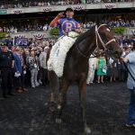 
              Mo Donegal, with jockey Irad Ortiz Jr., is paraded in the winner's circle after victory in the 154th running of the Belmont Stakes horse race, Saturday, June 11, 2022, at Belmont Park in Elmont, N.Y. (AP Photo/Eduardo Munoz)
            