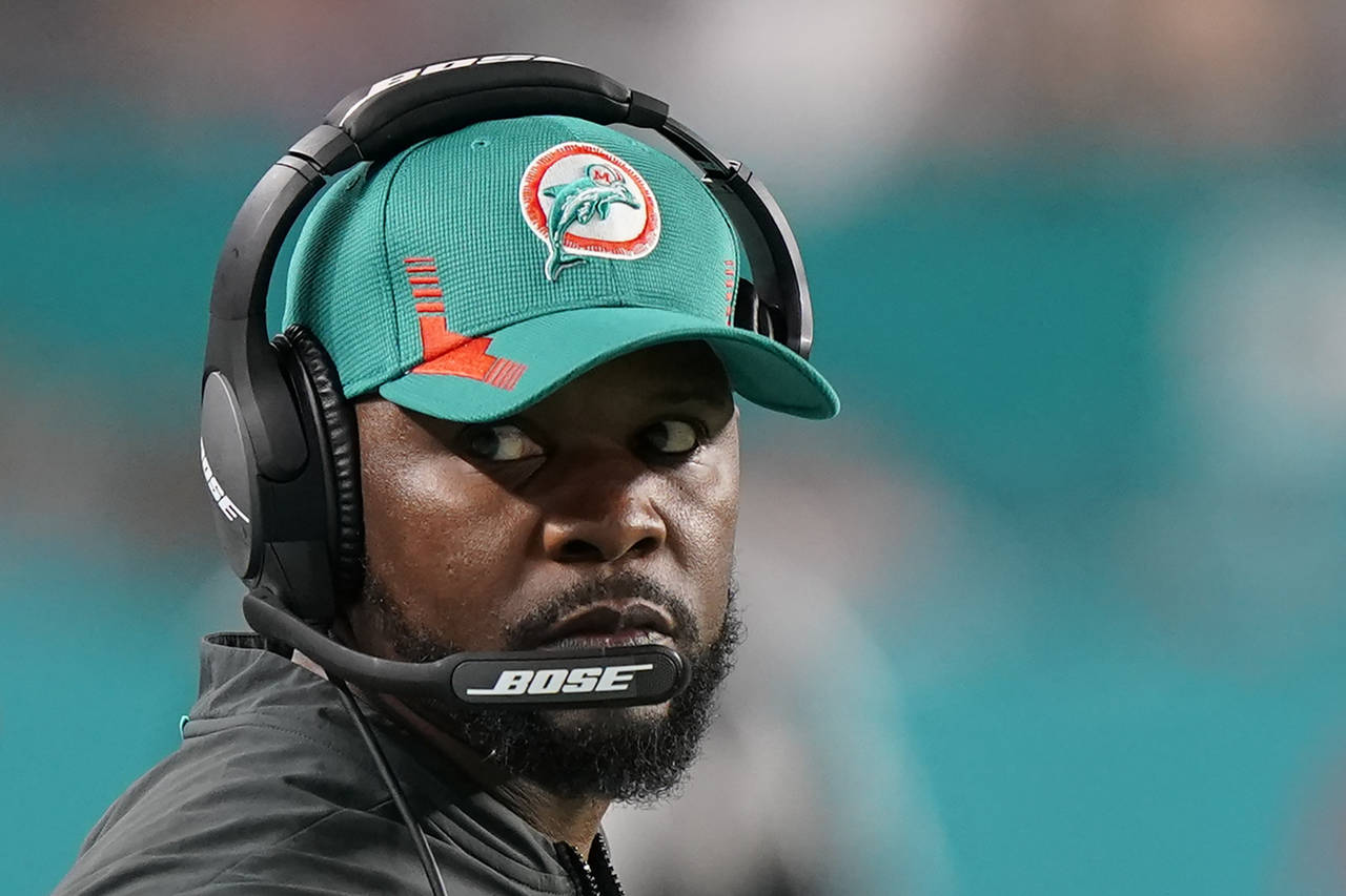 FILE - Miami Dolphins head coach Brian Flores during the second half of an NFL football game agains...