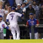 
              Chicago Cubs' Yan Gomes celebrates his home run off San Diego Padres starting pitcher Yu Darvish with manager David Ross, right, during the second inning of a baseball game Monday, June 13, 2022, in Chicago. (AP Photo/Charles Rex Arbogast)
            