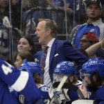 
              Tampa Bay Lightning head coach Jon Cooper is seen behind the bench during the second period of Game 6 of the NHL hockey Stanley Cup Finals against the Colorado Avalanche on Sunday, June 26, 2022, in Tampa, Fla. (AP Photo/Phelan Ebenhack)
            