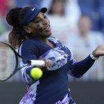 
              Serena Williams of the United States returns the ball during her quarterfinal doubles tennis match with Ons Jabeur of Tunisia against Shuko Aoyama of Japan and Hao-Ching of Taiwan at the Eastbourne International tennis tournament in Eastbourne, England, Wednesday, June 22, 2022. (AP Photo/Kirsty Wigglesworth)
            