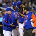 
              New York Mets manager Buck Showalter, left, talks to starting pitcher Tylor Megill, glove to face, who was pulled during the fourth inning of the team's baseball game against the Milwaukee Brewers on Thursday, June 16, 2022, in New York. (AP Photo/Frank Franklin II)
            